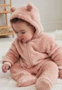 Baby's pink teddy onesie with ears