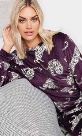 Woman in printed purple loungewear set